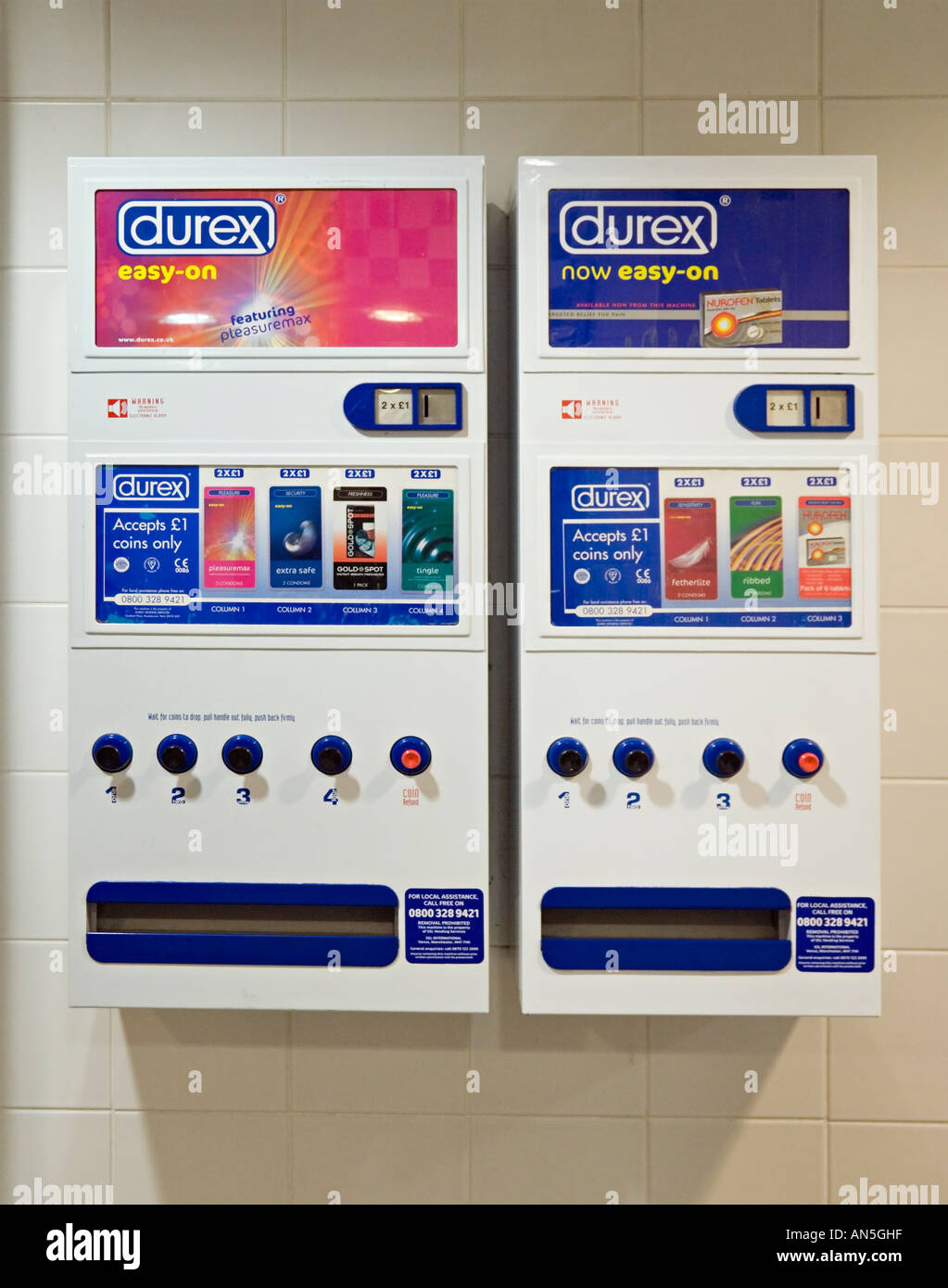 Automatic condom dispensing machines mounted on the wall in a gents toilet  Stock Photo - Alamy