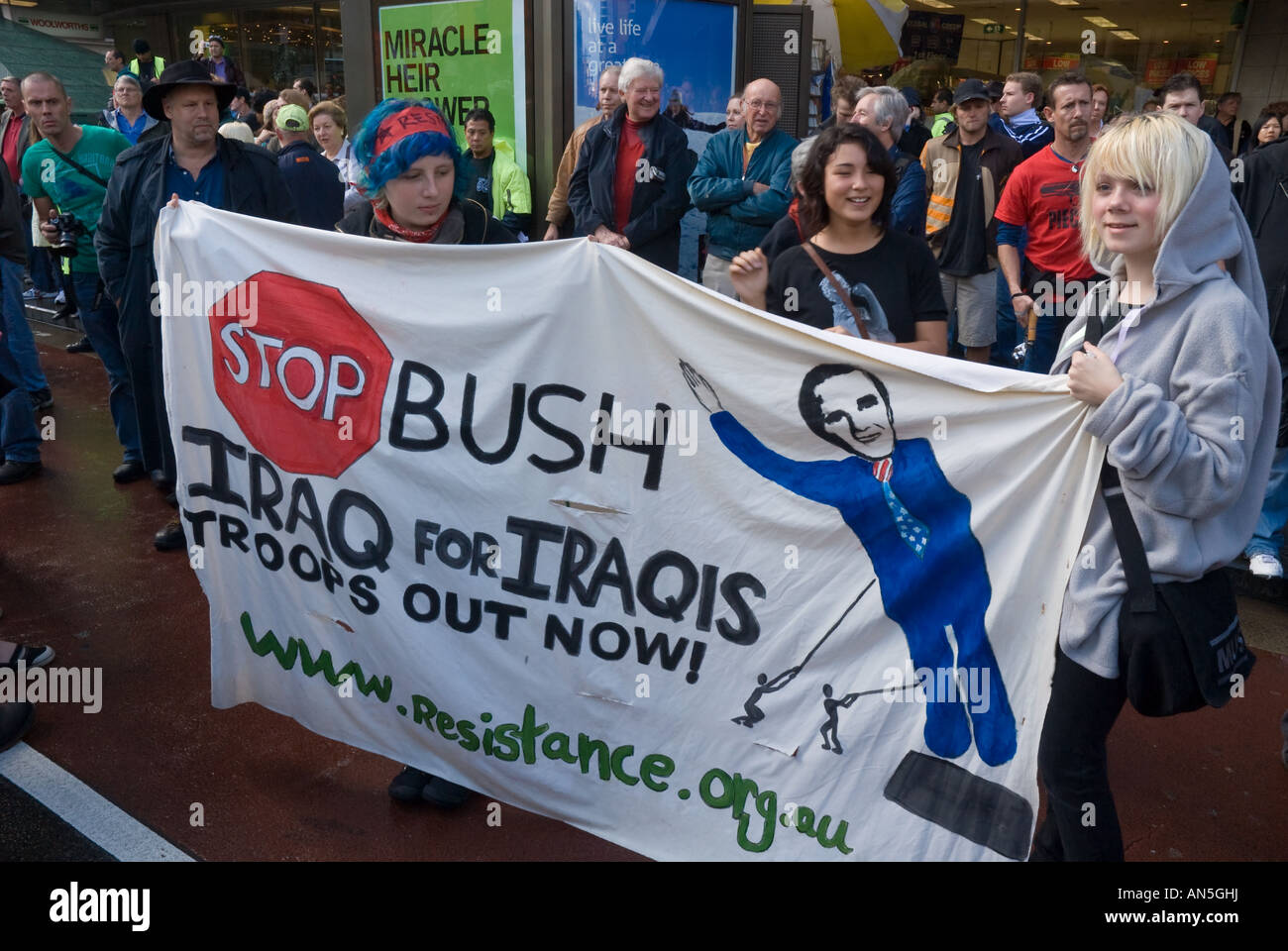 Anti-Bush protesters at a protest march during the APEC summit, Sydney, Australia, Activists.Protest slogan. Stop Bush protest. Stock Photo