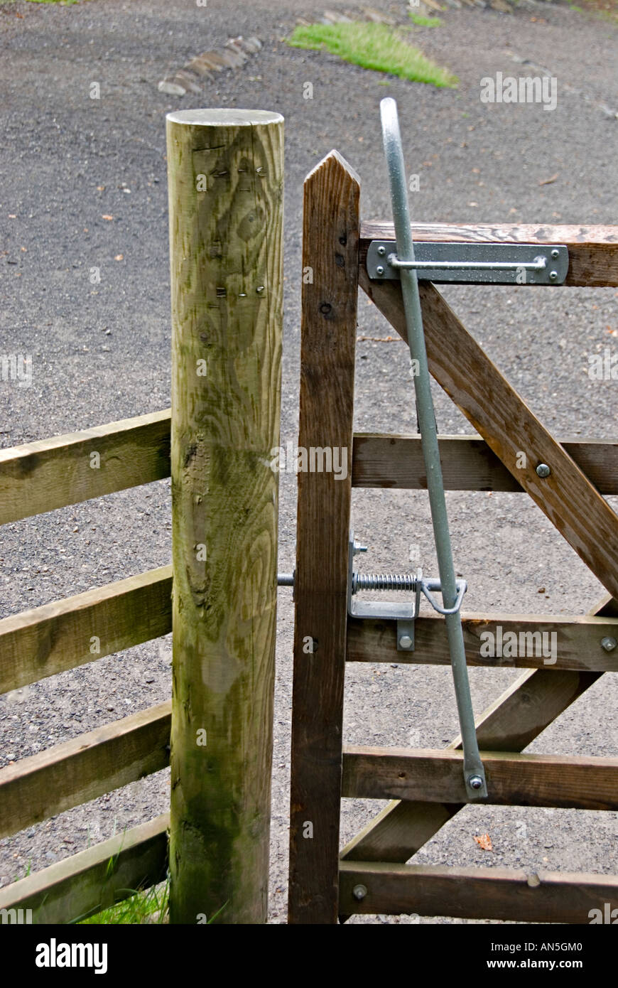 A wooden gate designed for easy access by wheelchair users Stock Photo