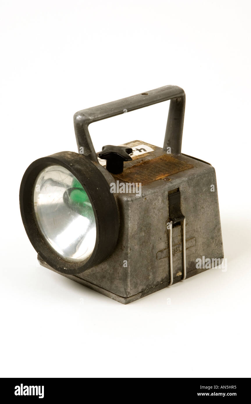 A Heavy duty portable hand held battery operated torch on white