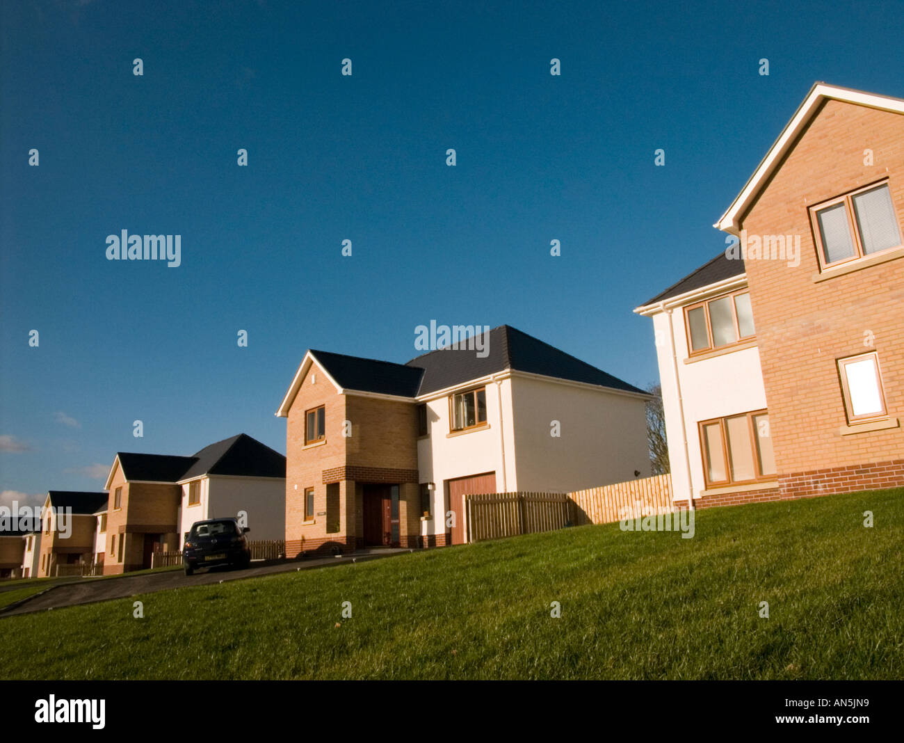 Row of newly built executive homes, Cae'r Wylan private housing estate