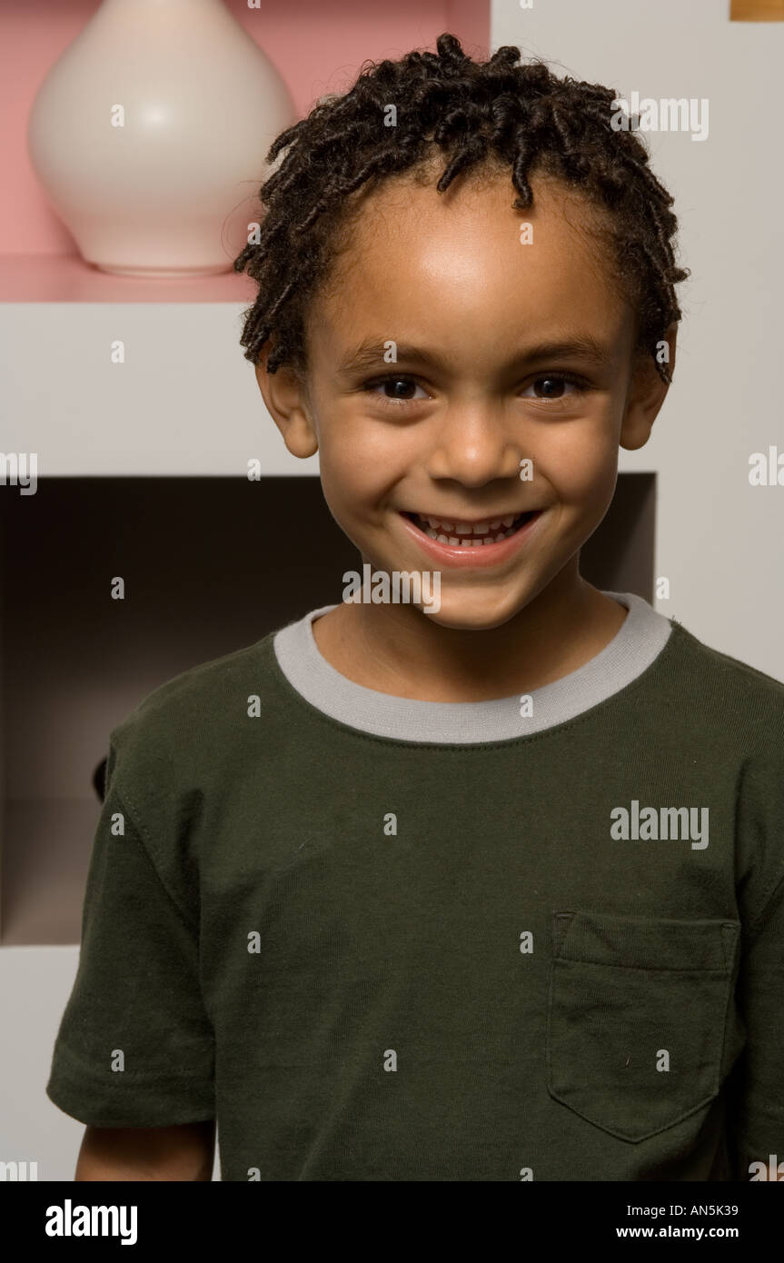 Portrait of a young boy smiling Stock Photo - Alamy