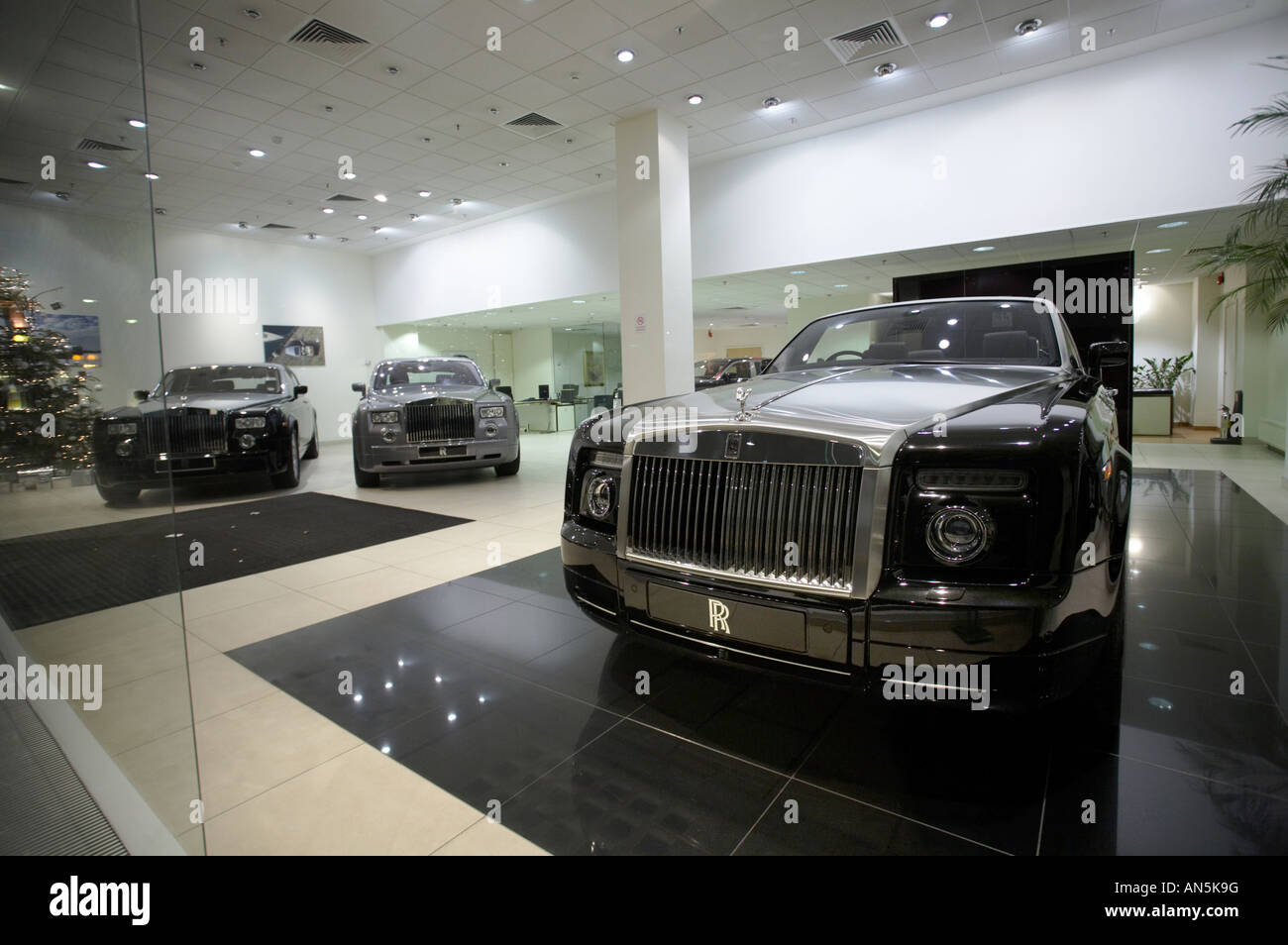 Rolls Royce cars in showroom window London England UK Stock Photo - Alamy