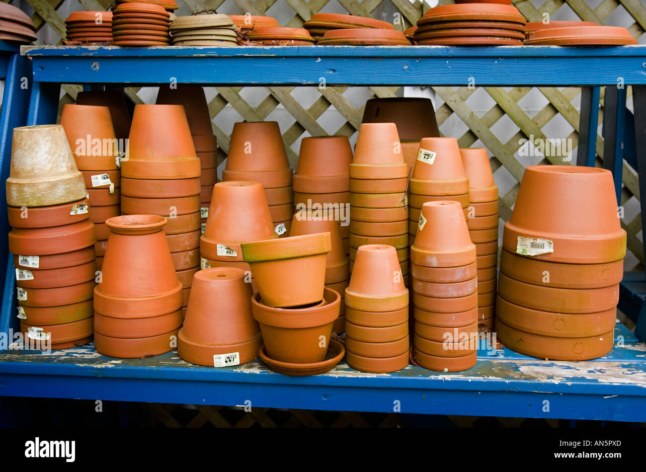 Clay pots for sale at a nursery Stock Photo Alamy