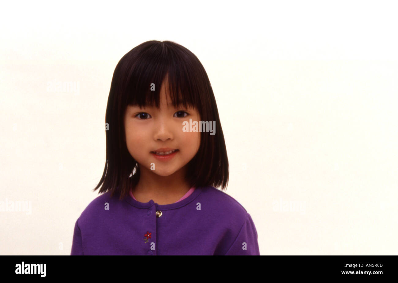 Portrait of an Asian girl smiling Stock Photo - Alamy