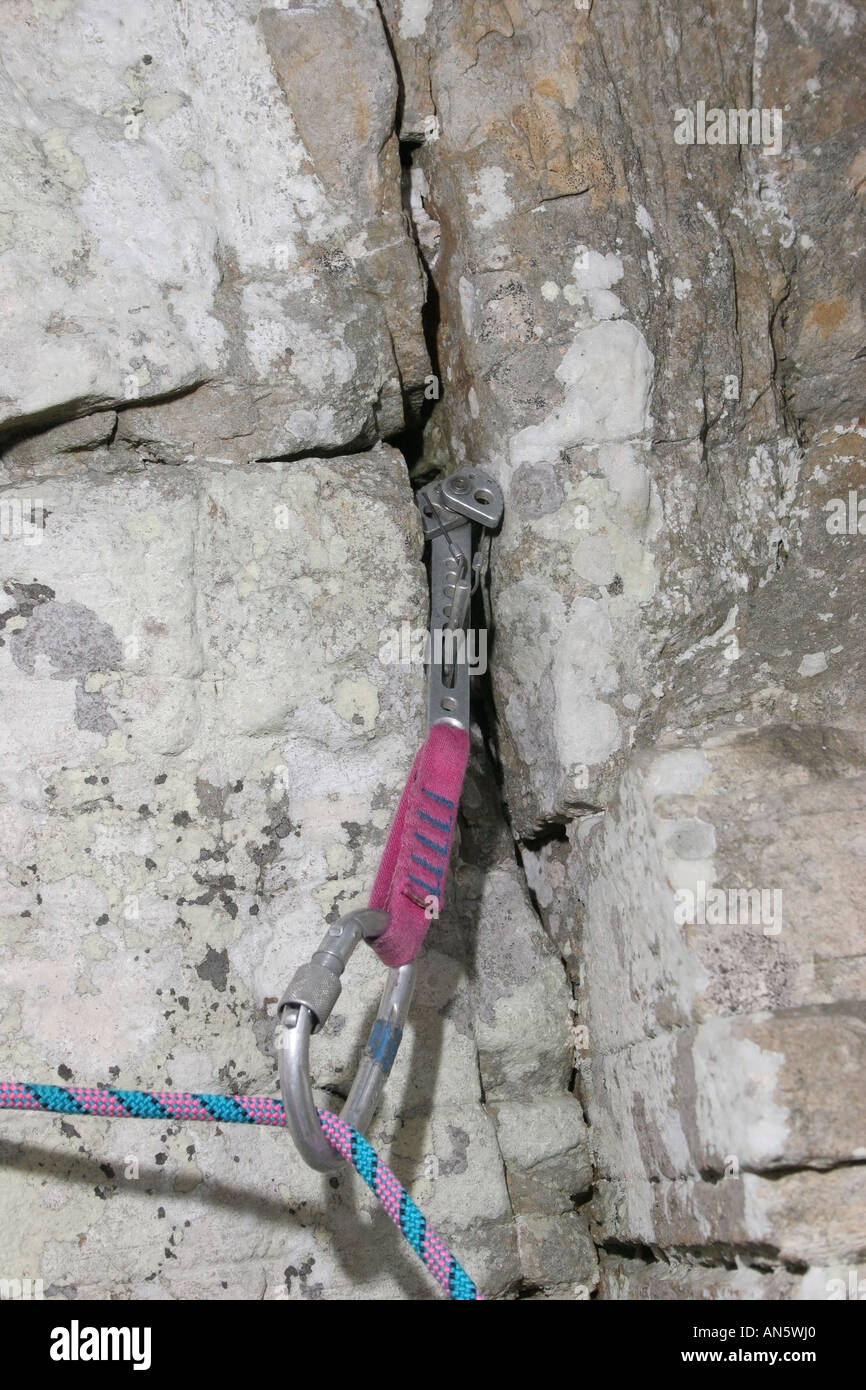 Lead Rock Climbers Protection Equipment showing Friend top and scew