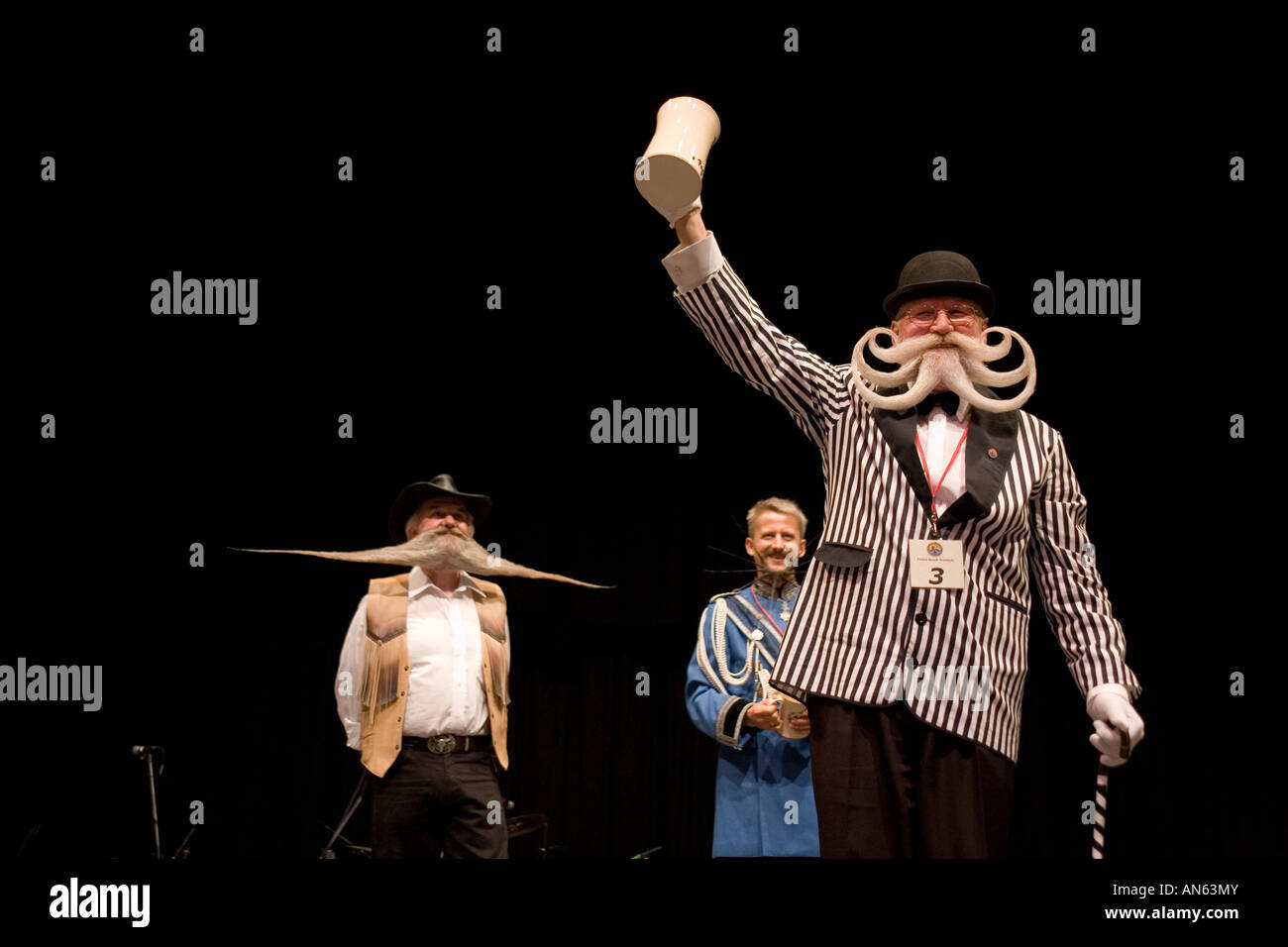 Contestants on stage at the World Beard and Moustache Championships, Brighton, England, 2009. Stock Photo