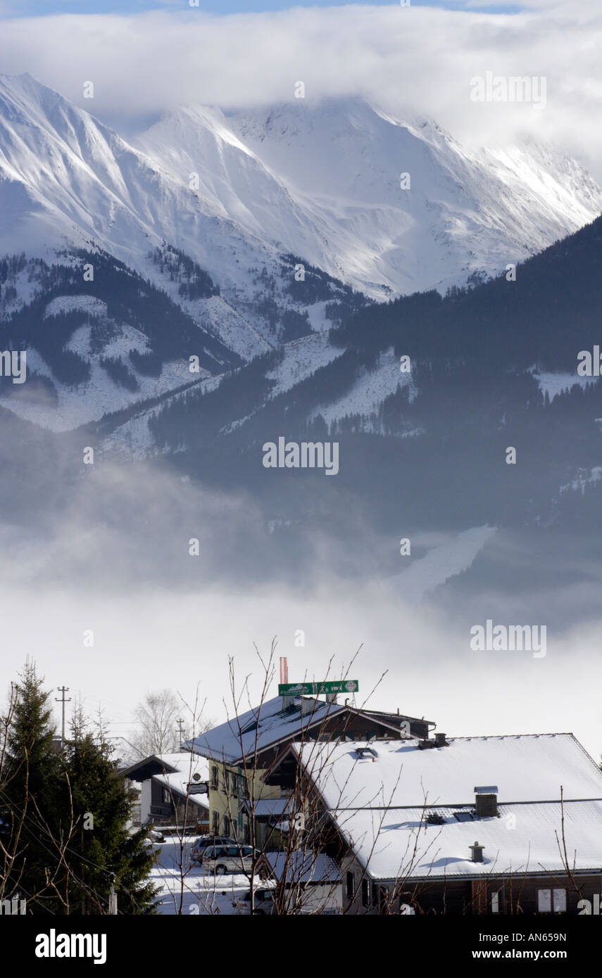 Foggy Winter Day near Mittersill Austria The Alps in the background are covered in snow A snowstorm has just passed Stock Photo
