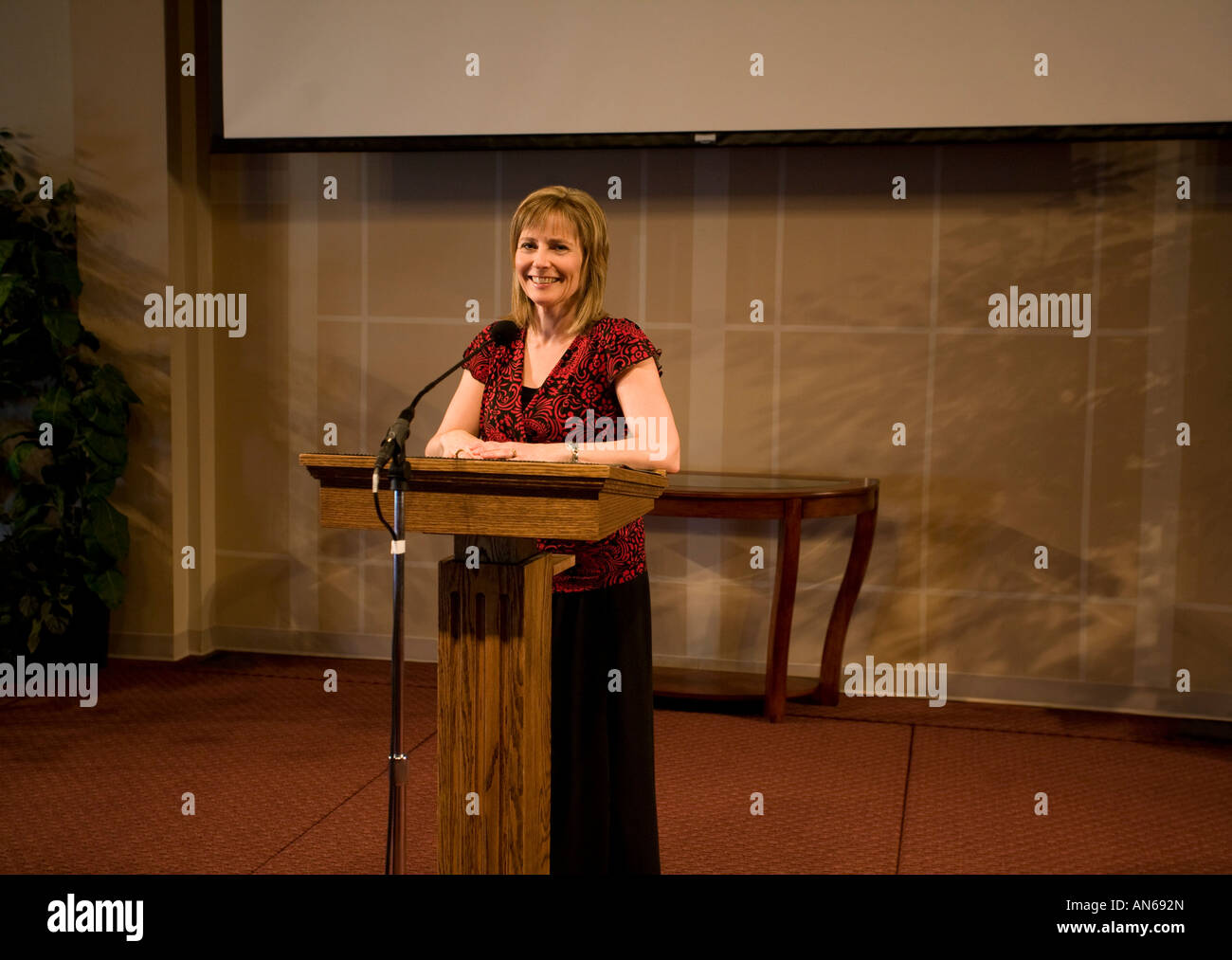 A woman giving a speech Stock Photo