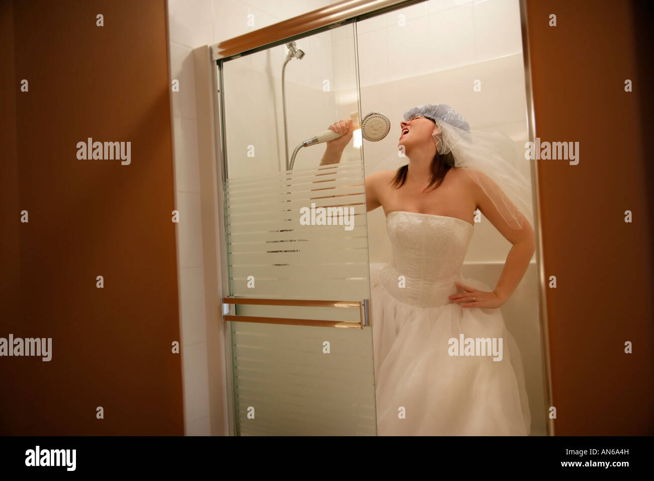 Woman singing shower hi-res stock photography and images - Alamy