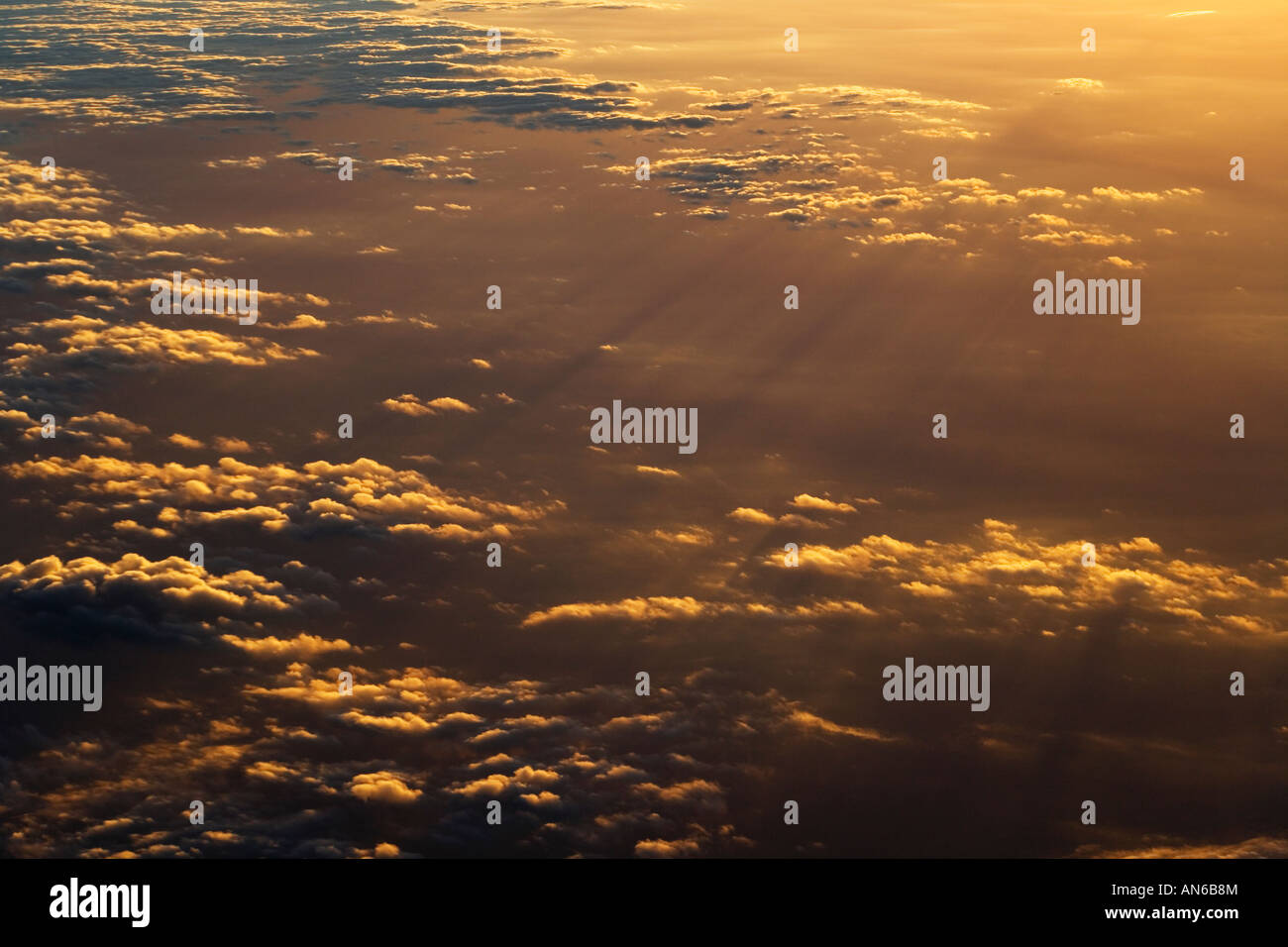 Aerial view of sunlight breaking through the clouds Stock Photo