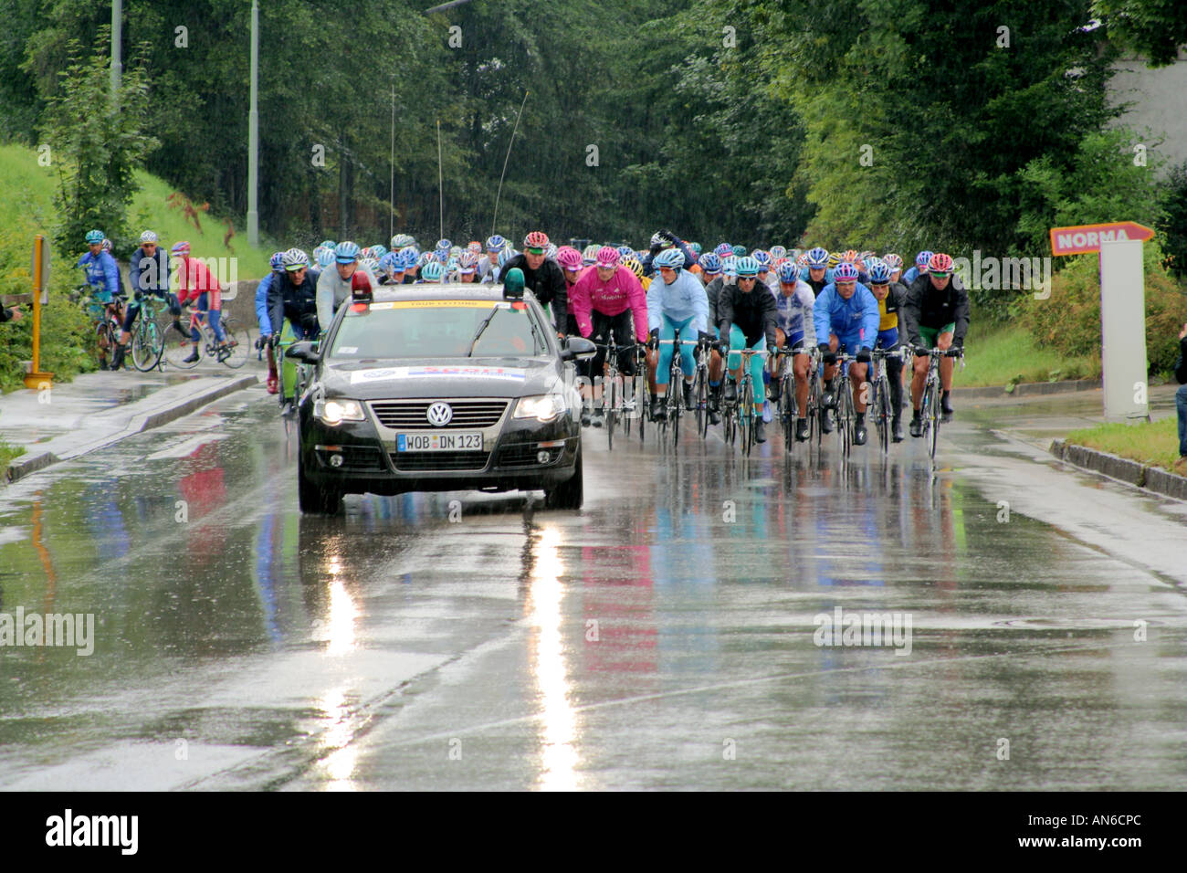 Starting line following car at professional bicycle race German Tour 2006 Bad Toelz Bavaria Germany Stock Photo