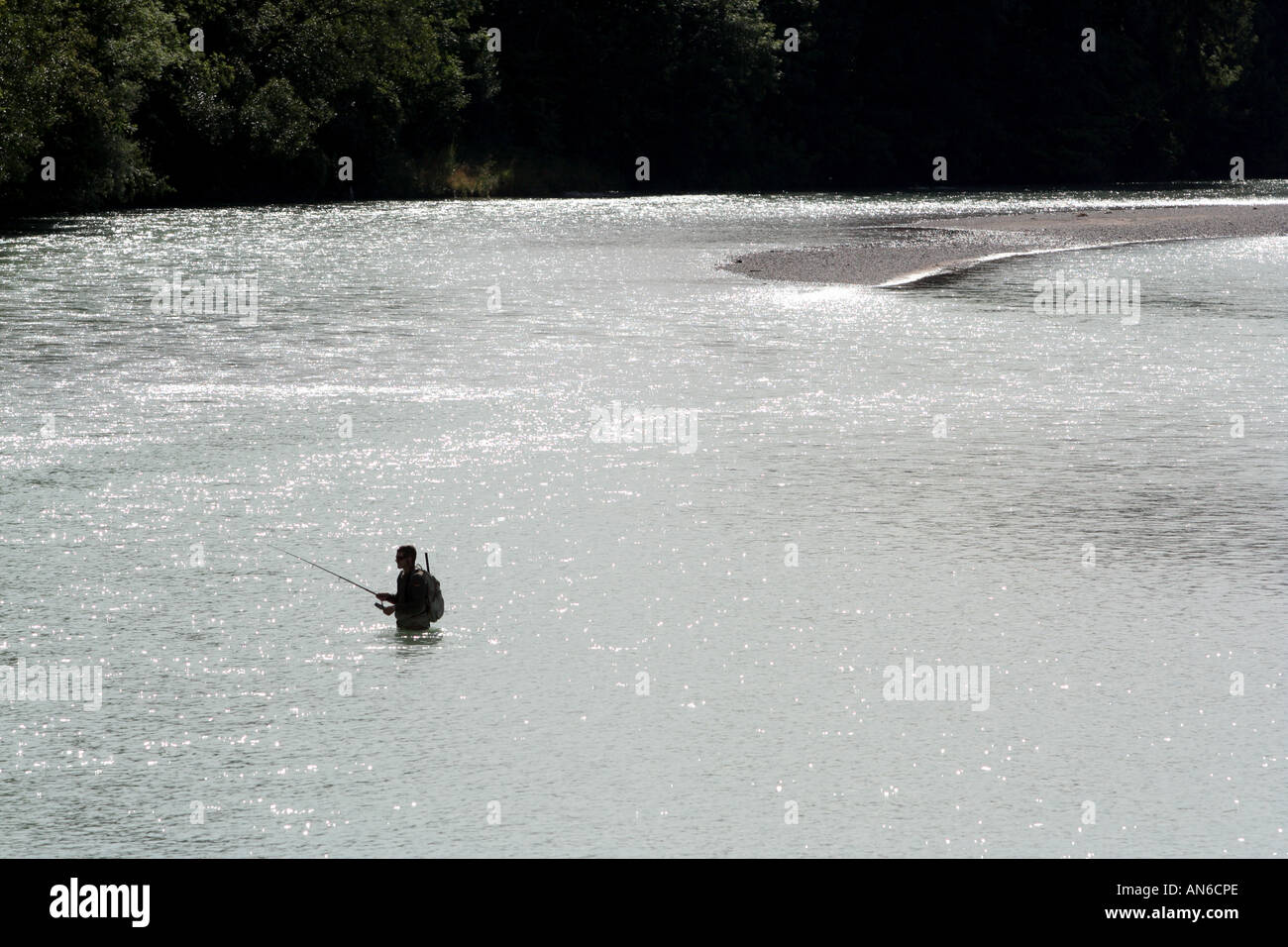 early morning fishing in the River Isar Bad Toelz Bavaria Germany Stock Photo