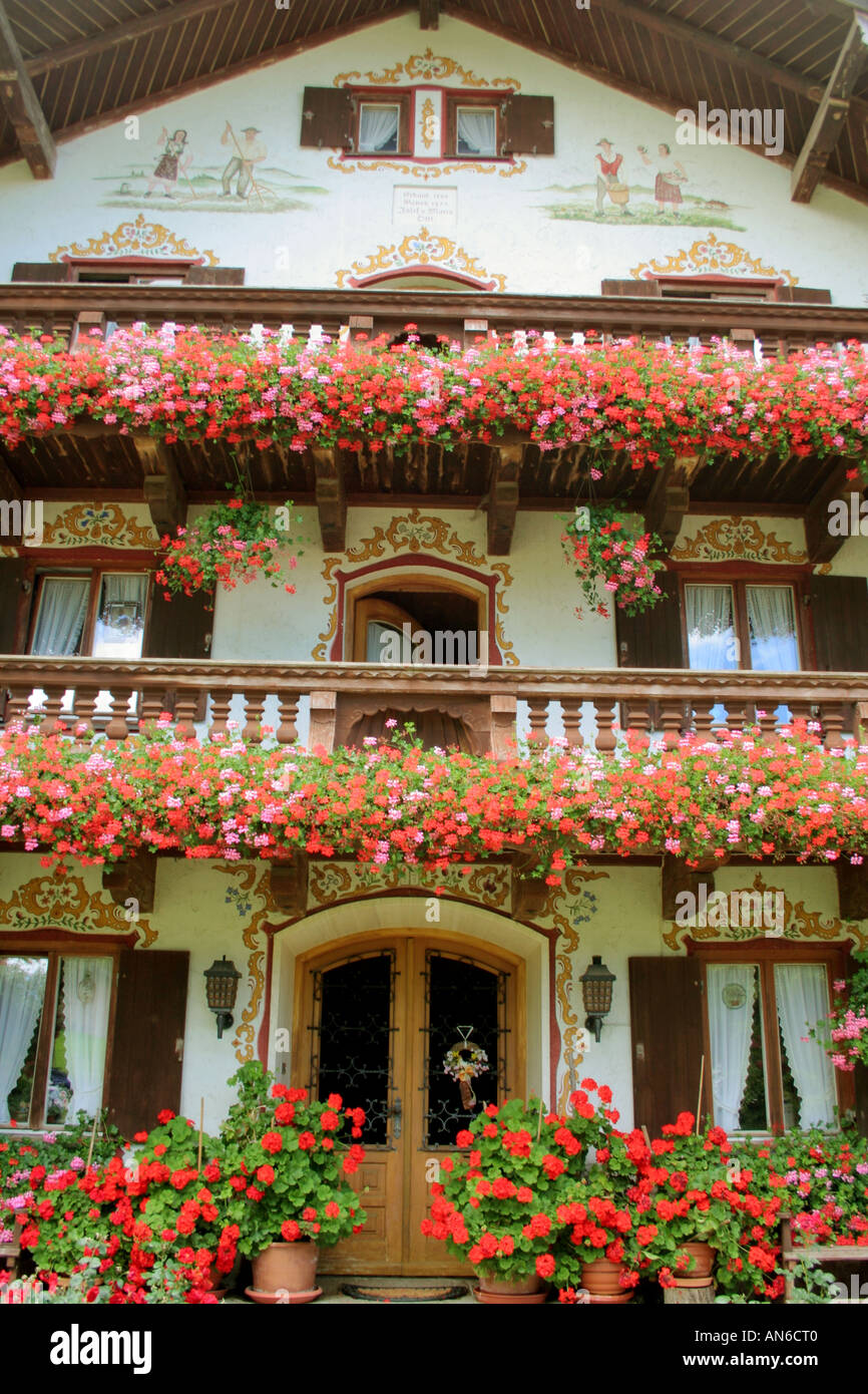 traditional Bavarian farmhouse richly decorated with flowers near Bad ...
