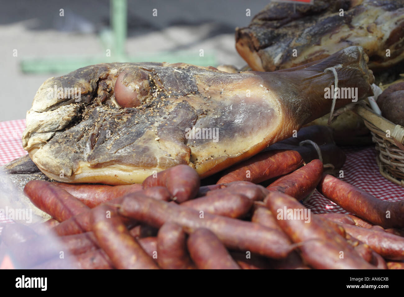 Ardennes sausages and ham on a market stall in the Province of Luxembourg in South Belgium Stock Photo
