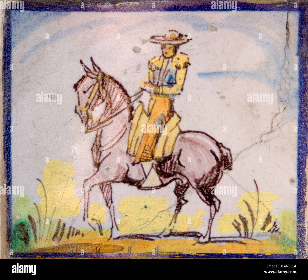 Ceramic tile of Spanish man riding horse Stock Photo