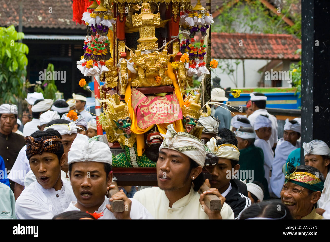 Carrying offering for Odalan Ceremony at Pura Basukian or Besakih Puseh Jagat Hindu Temple Bali Indonesia Stock Photo