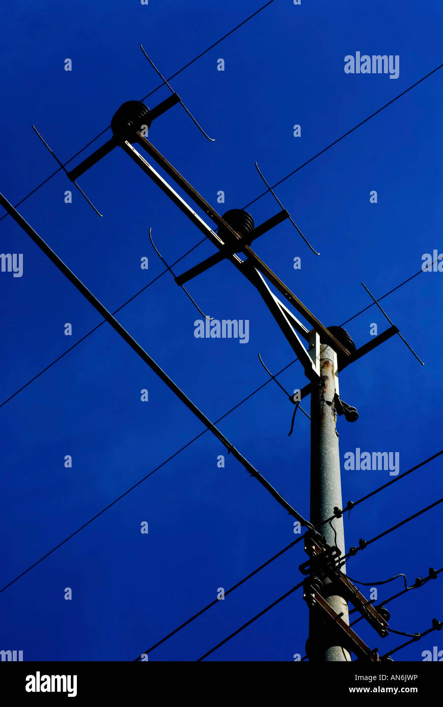 communication antenna on a dark blue sky background Stock Photo - Alamy