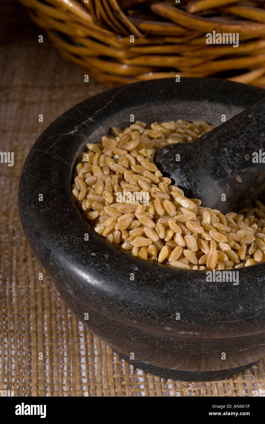 Wheat grain with Pestle and Mortar Stock Photo Alamy