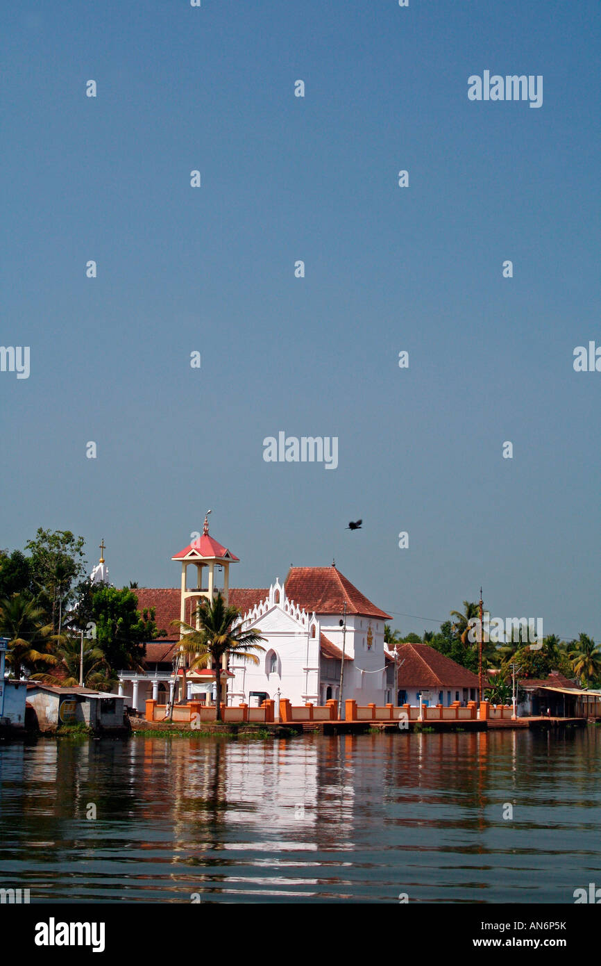 Chembakkulam church, one of the oldest churches in Kerala viewed from a houseboat cruising the backwaters Stock Photo