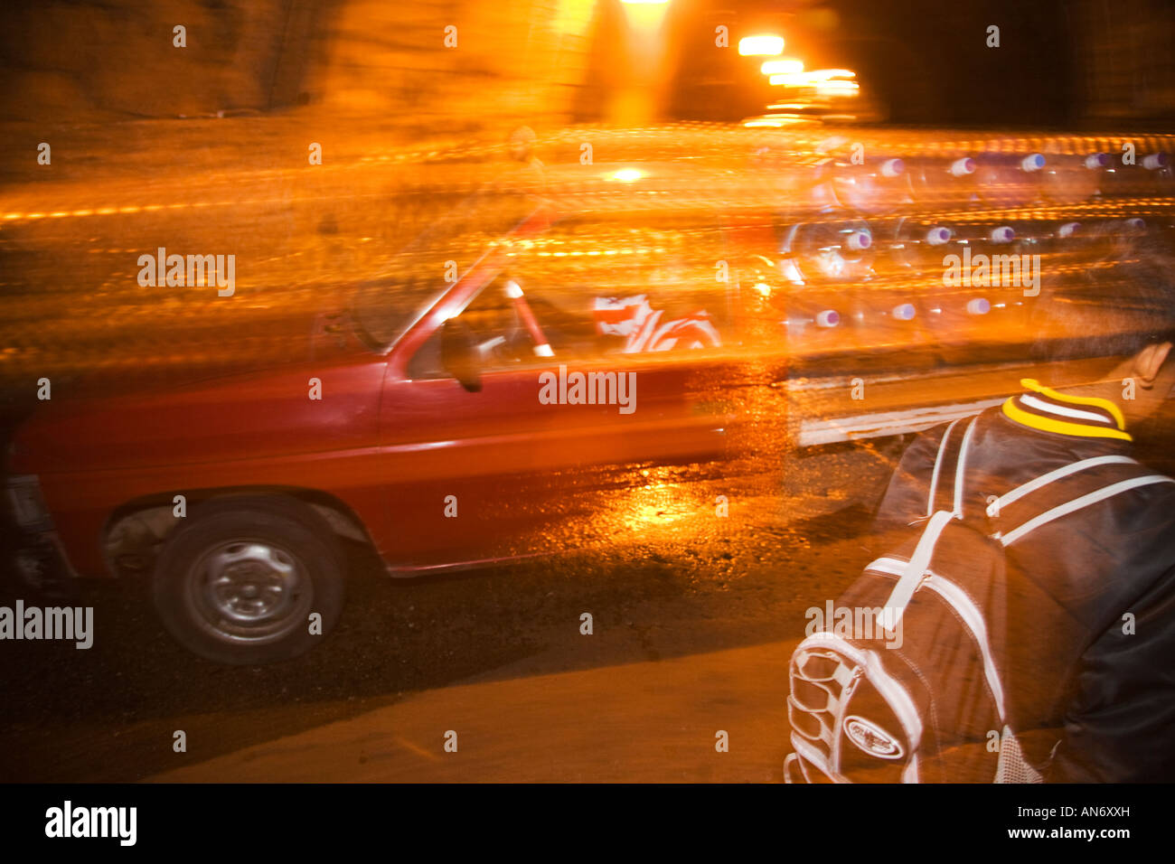 MEXICO Guanajuato Pedestrian and truck blurred motion in tunnel underground road system in city Stock Photo