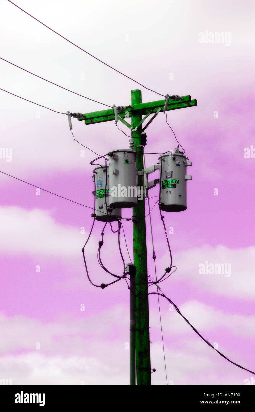 Electrical wires transformer power lines with strange surreal sky Stock Photo