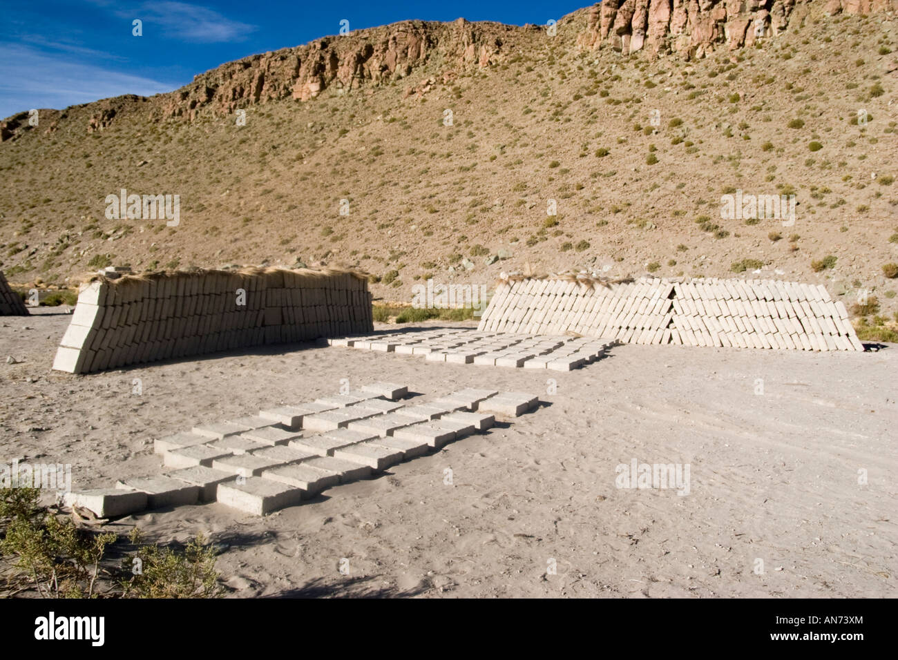 Manufacture of mud bricks- drying in the sun, Bolivia Stock Photo - Alamy