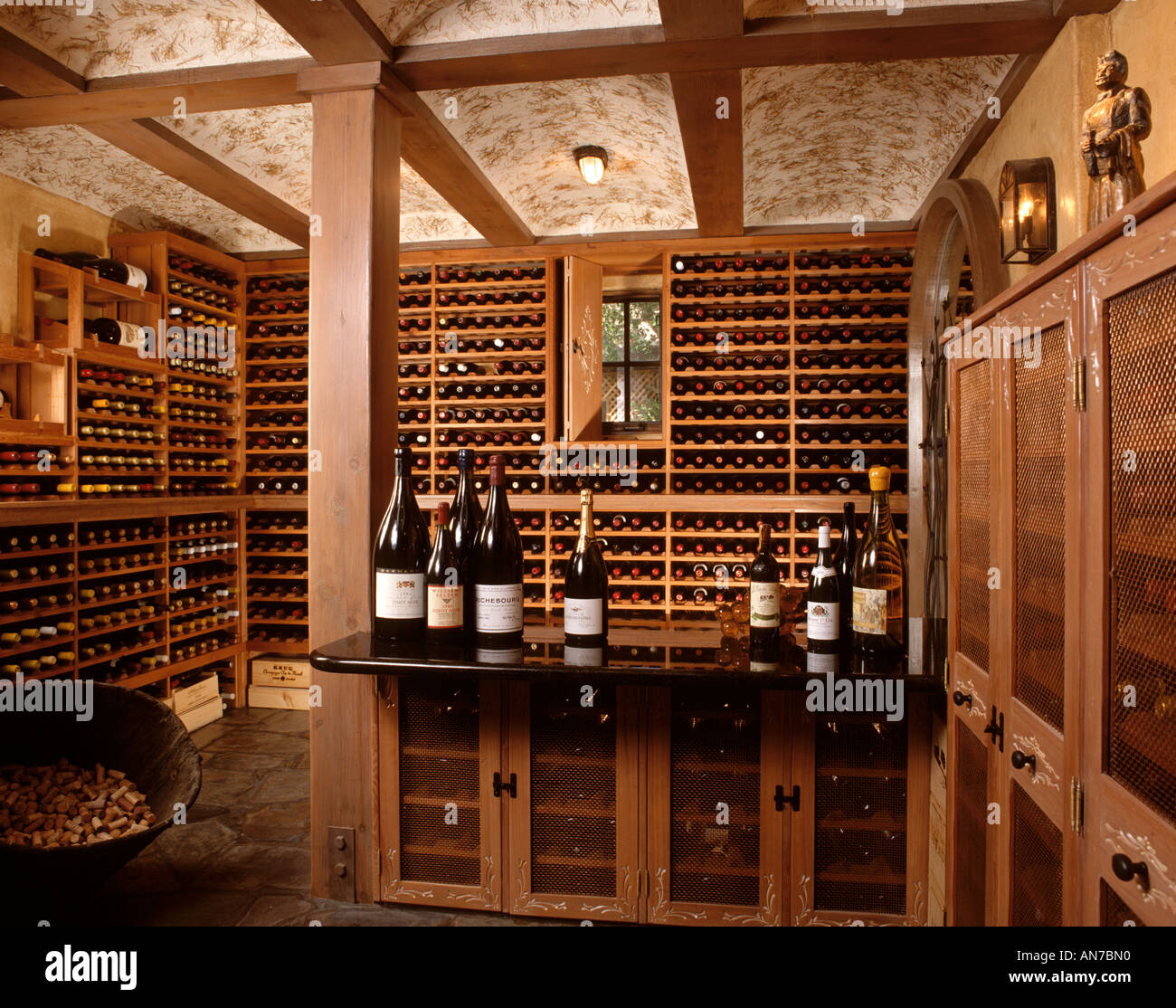 A beautiful private WINE CELLAR is satocked with a wide selection of