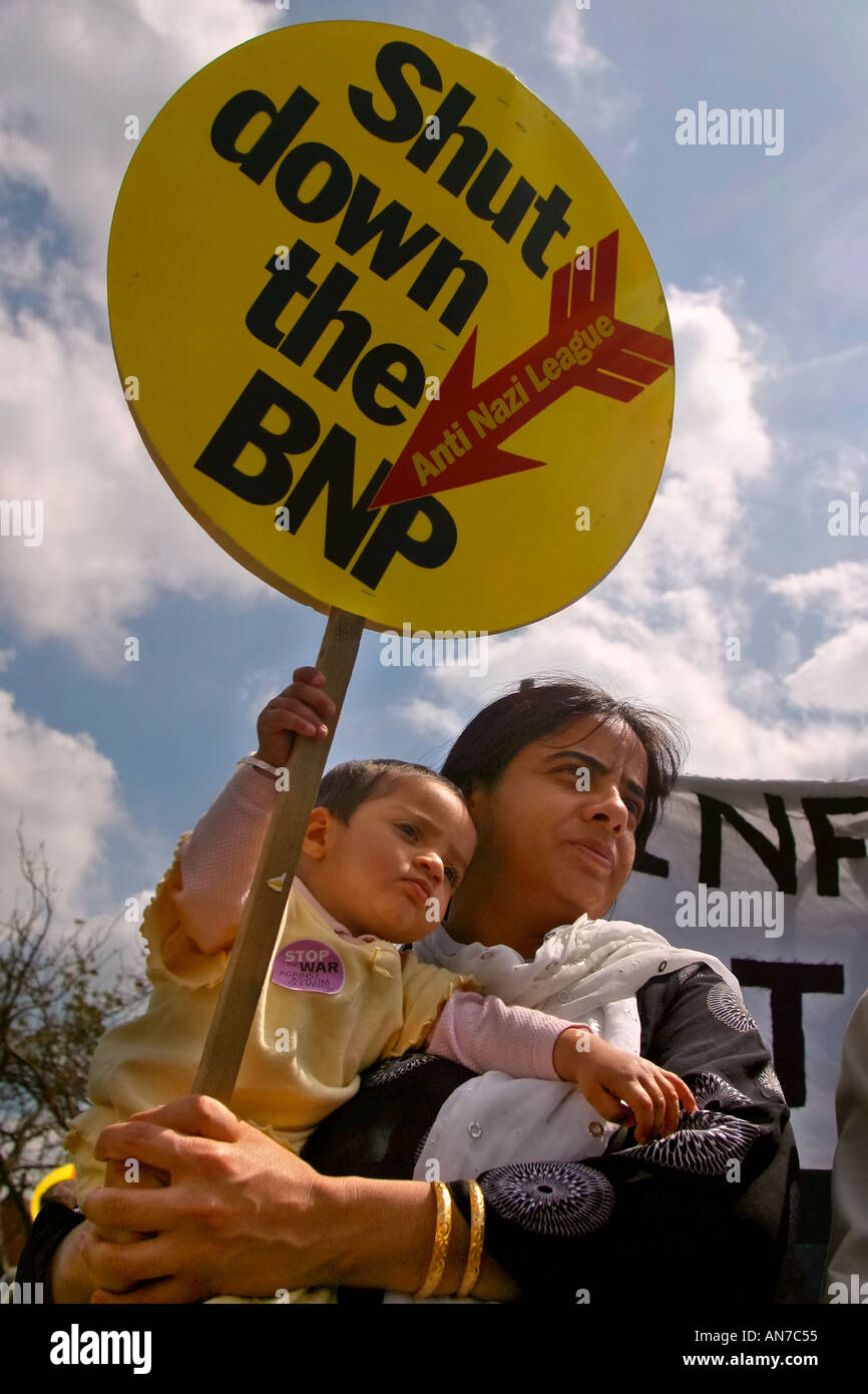 Asian mother and child march against neo nazi British National Party Cheshunt England Stock Photo