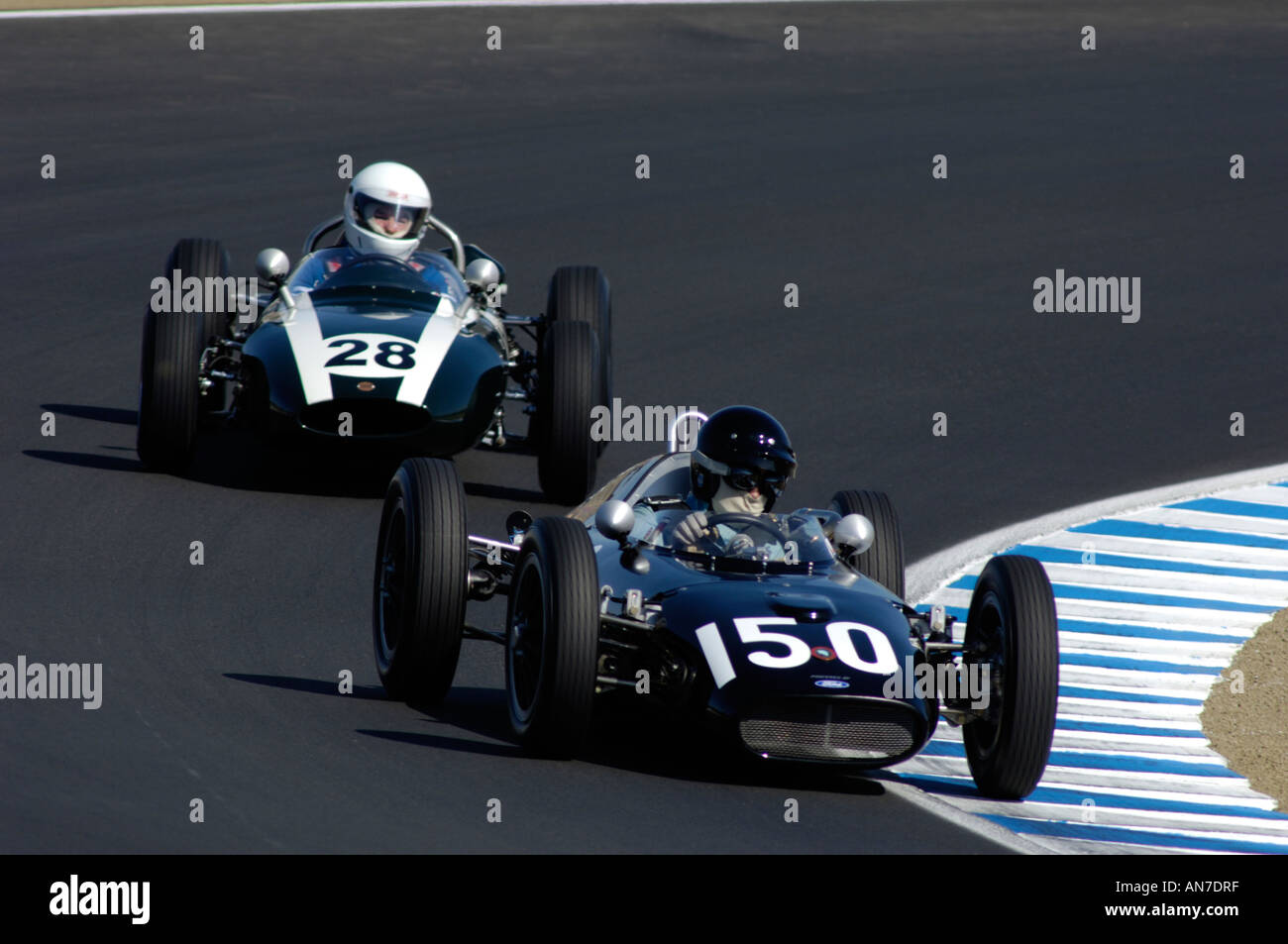 1961 Dolphin Mk II Formula Junior followed by a 1961 Cooper T-56 Formula Junior at the 33rd Rolex Monterey Historic Races 2006 Stock Photo