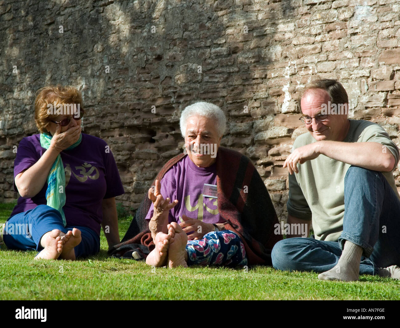 Adults sitting around telling stories Richard Moss retreat Poulstone Court Hereford Herefordshire England Britain UK Stock Photo