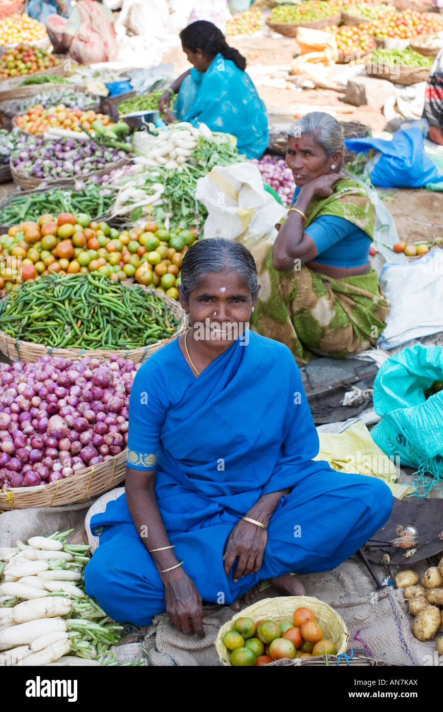 Indian women selling vegetables at a market. Puttaparthi, Andhra Pradesh, India Stock Photo