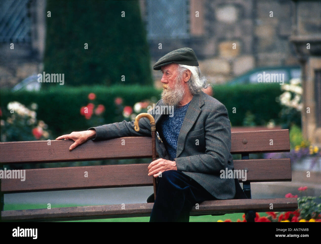Man sits on a bench hi-res stock photography and images - Alamy