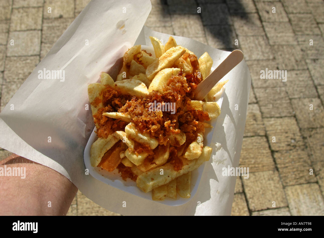 Bag of chips with scraps ready to be eaten Stock Photo Alamy