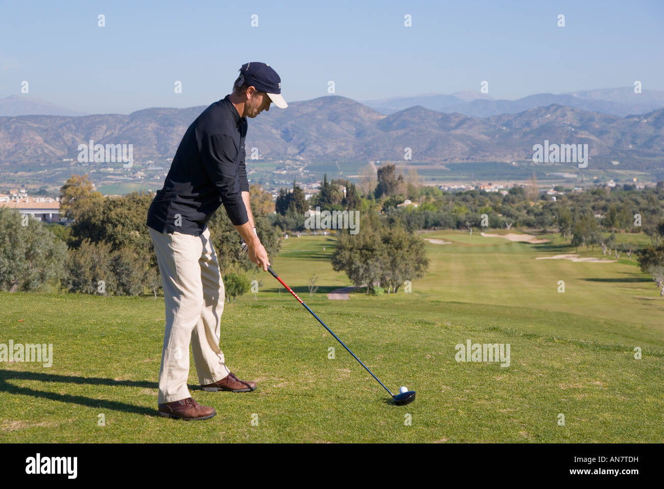 Alhaurin de la Torre Malaga Lauro Golf course Addressing the ball before driving from a tee Stock Photo