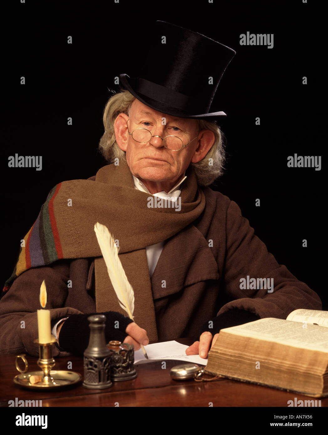 THE ELDERLY EBENEZER SCROOGE AT HIS DESK Stock Photo Alamy