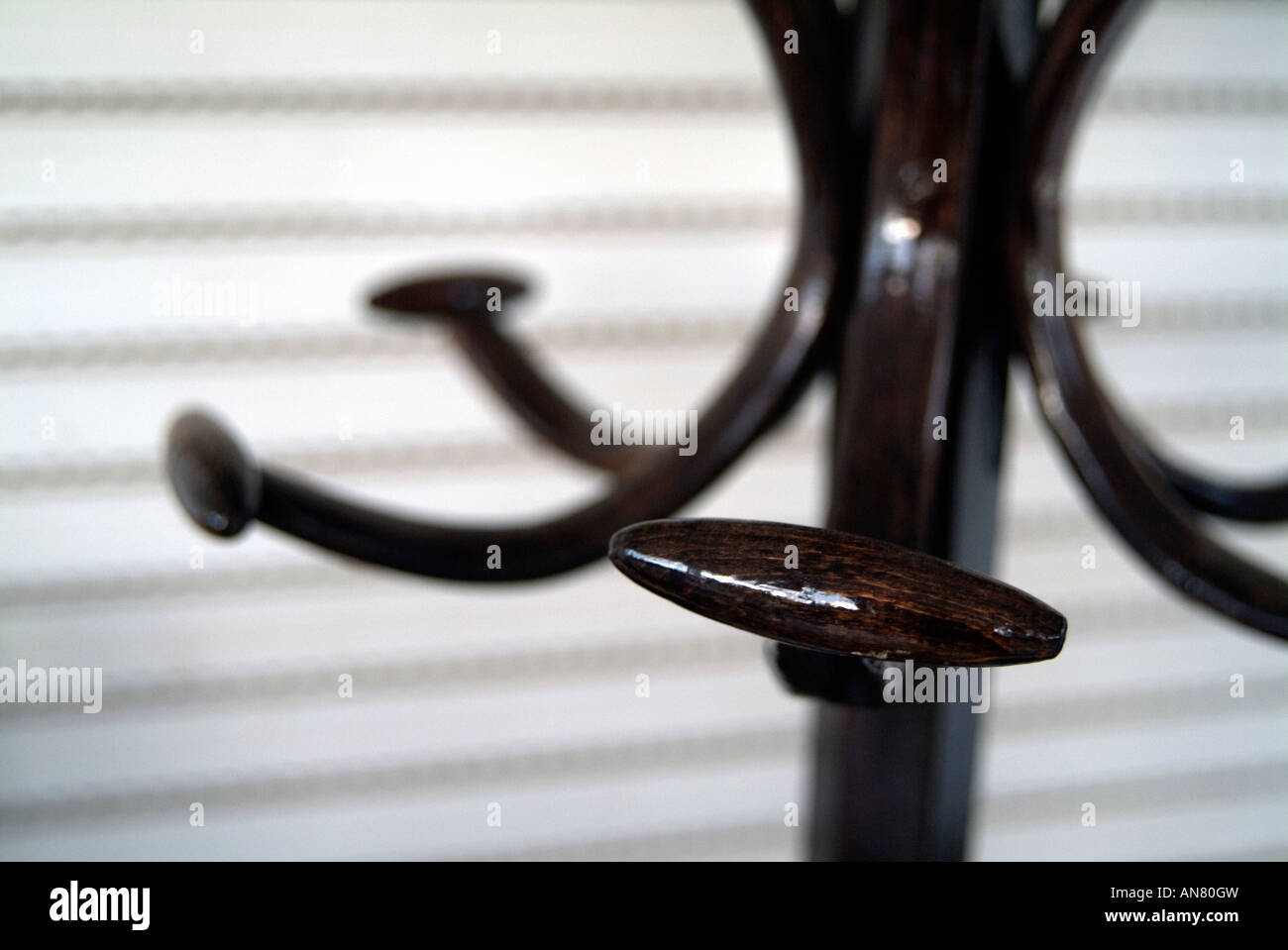 Old fashioned dark wooden coat rack Stock Photo Alamy