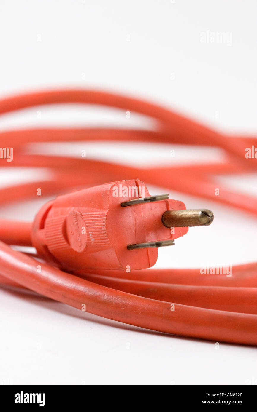 Orange extension cord with three prong grounded U S type plug Stock