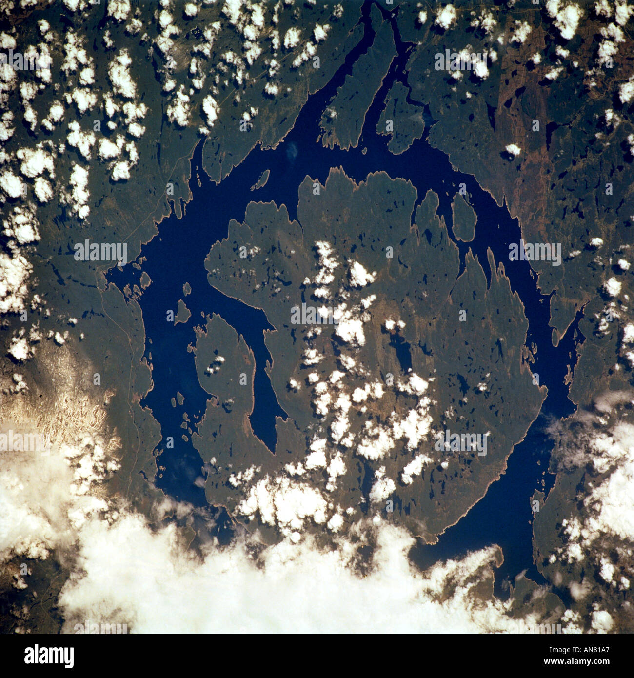 This photo showing the Manicouagan Reservoir in Quebec Canada was photographed by the STS 111 crewmembers Stock Photo