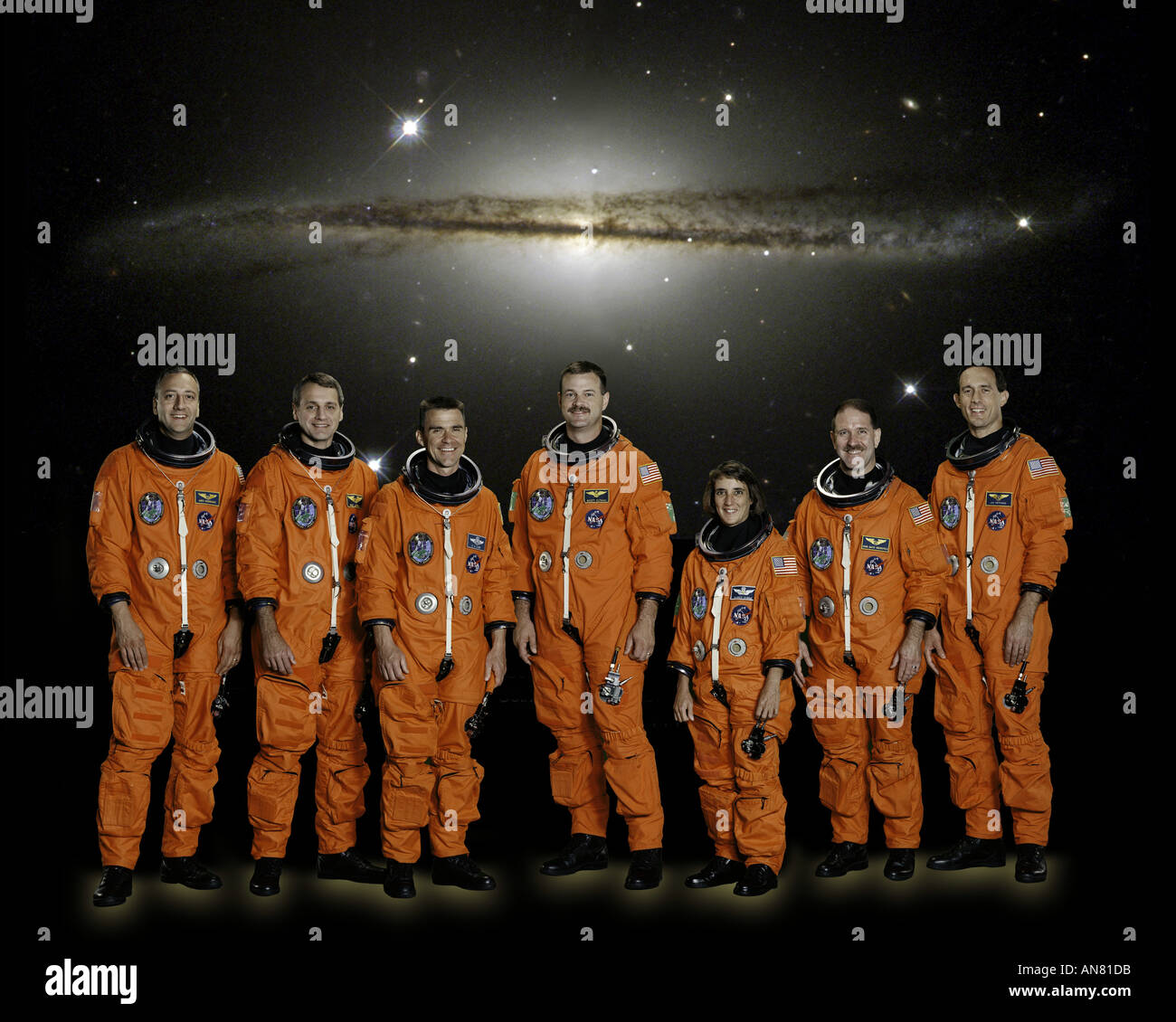 Seven astronauts  STS 109 mission pose traditional pre-flight crew portrait Stock Photo