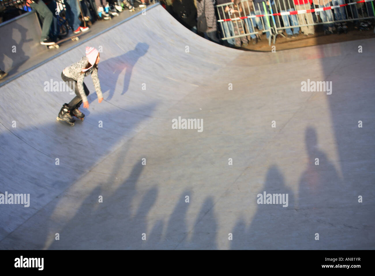 inline skater girl in skate half pipe at skatepark Stock Photo Alamy