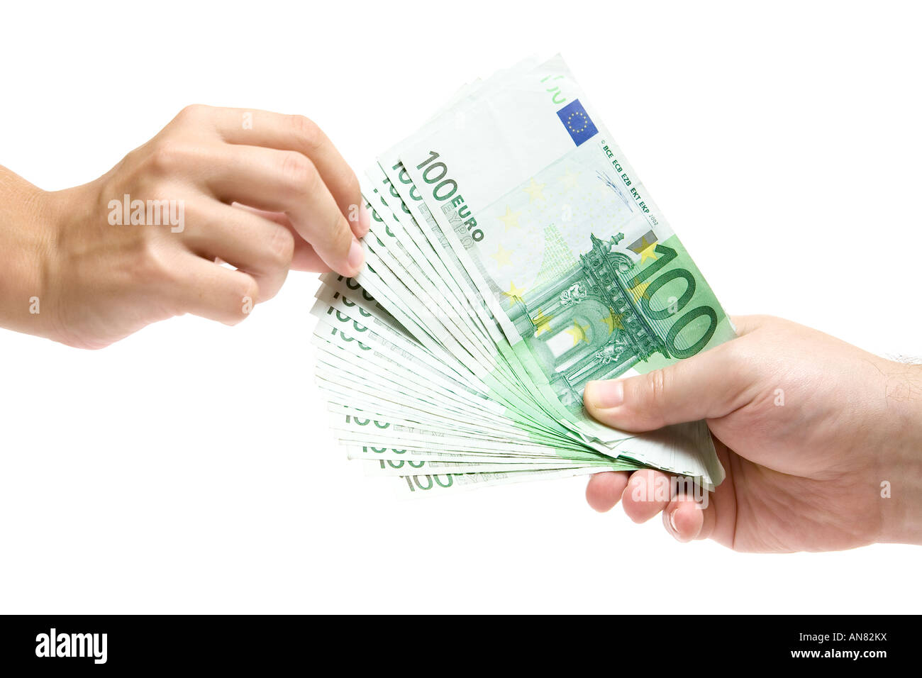 Female hand grabbing Euro banknotes. Isolated on a white background. Stock Photo