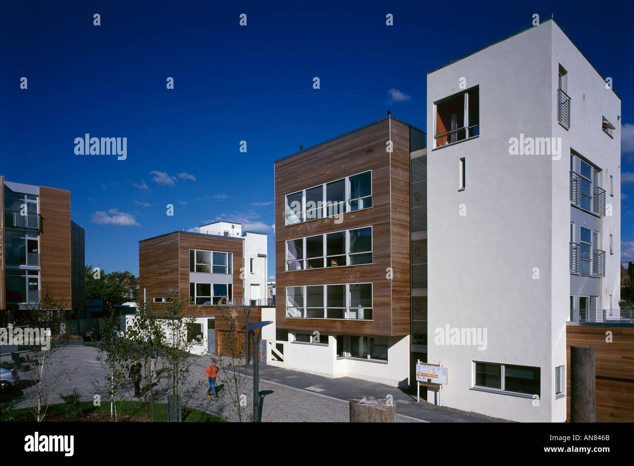 Homes For The Future, Glasgow, Scotland. Multistorey block with concrete and wood facades