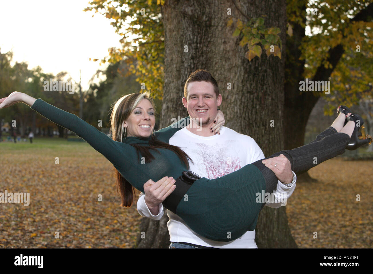 A young couple having fun at the park Stock Photo