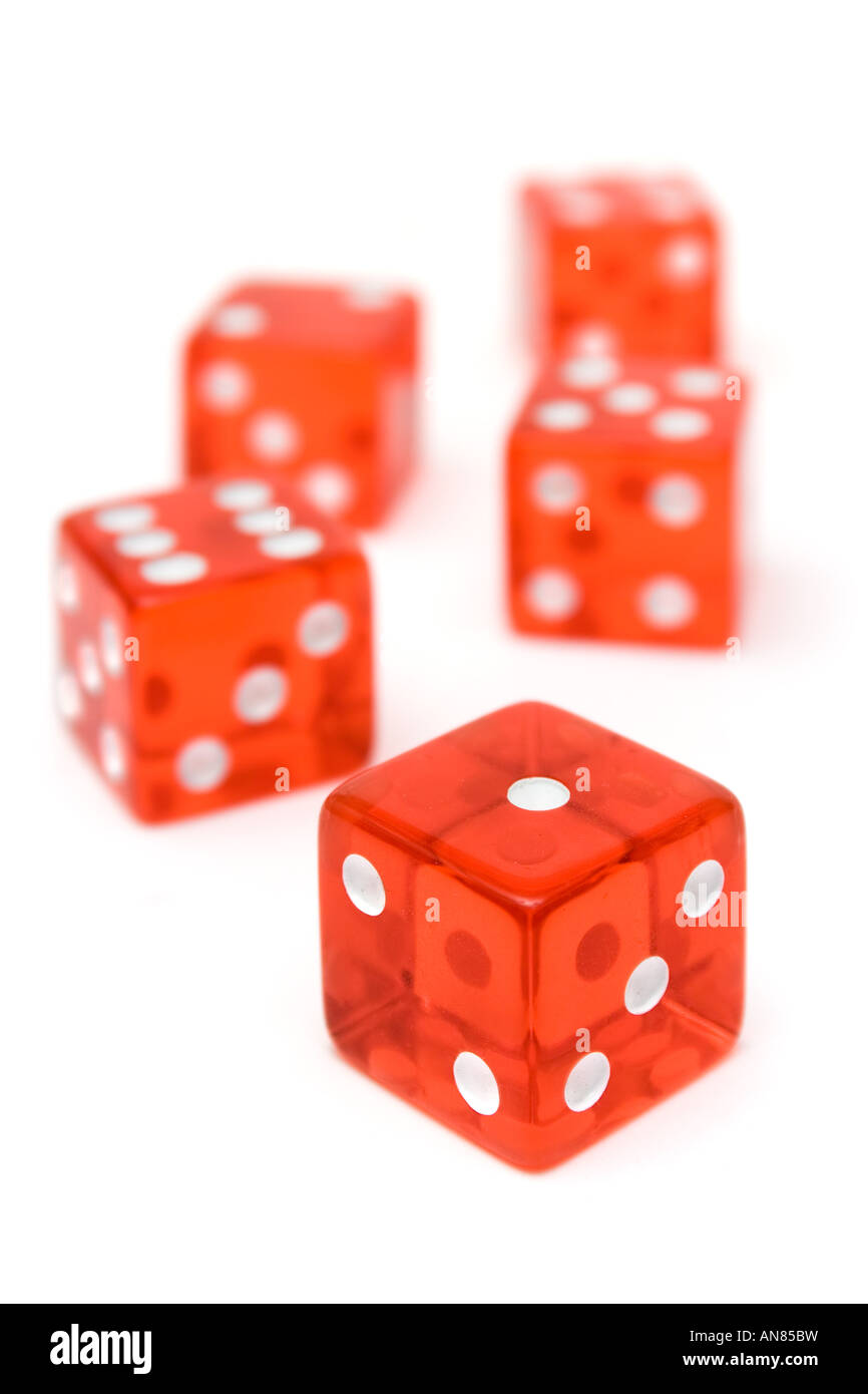 Translucent dice isolated on a white background. Shallow depth of field. Stock Photo