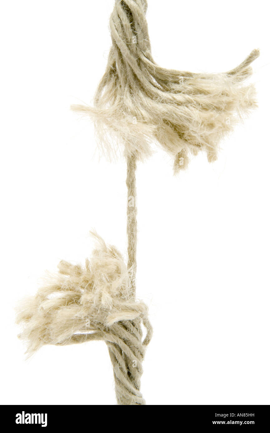 Breaking rope isolated on a white background Stock Photo - Alamy