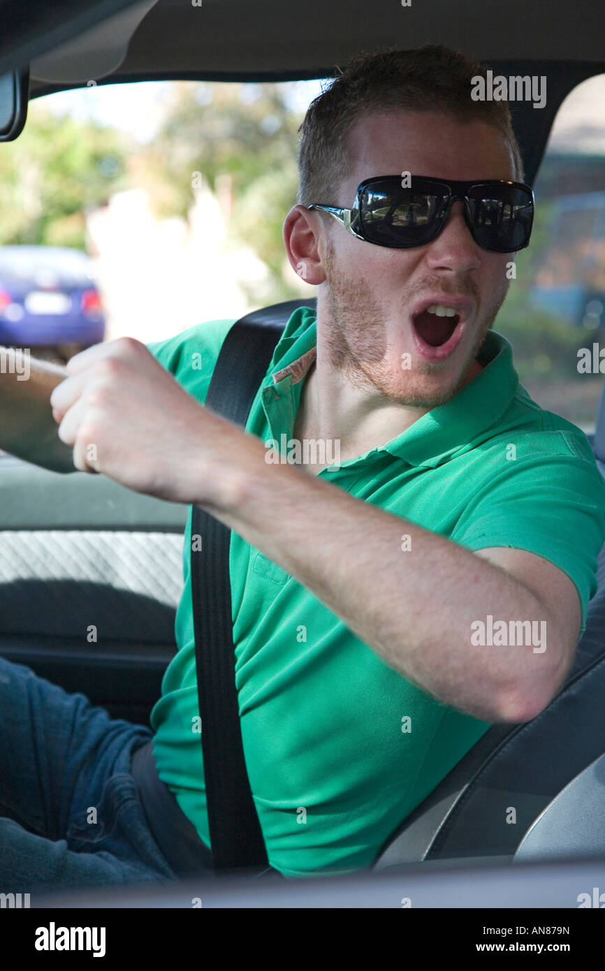 young man with road rage anger Stock Photo - Alamy