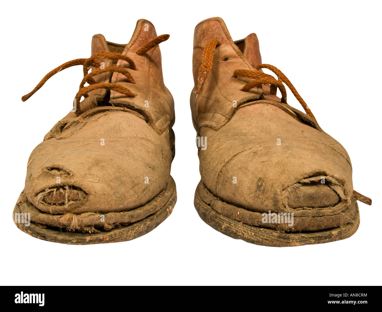Old worn out working boots with holes Stock Photo - Alamy