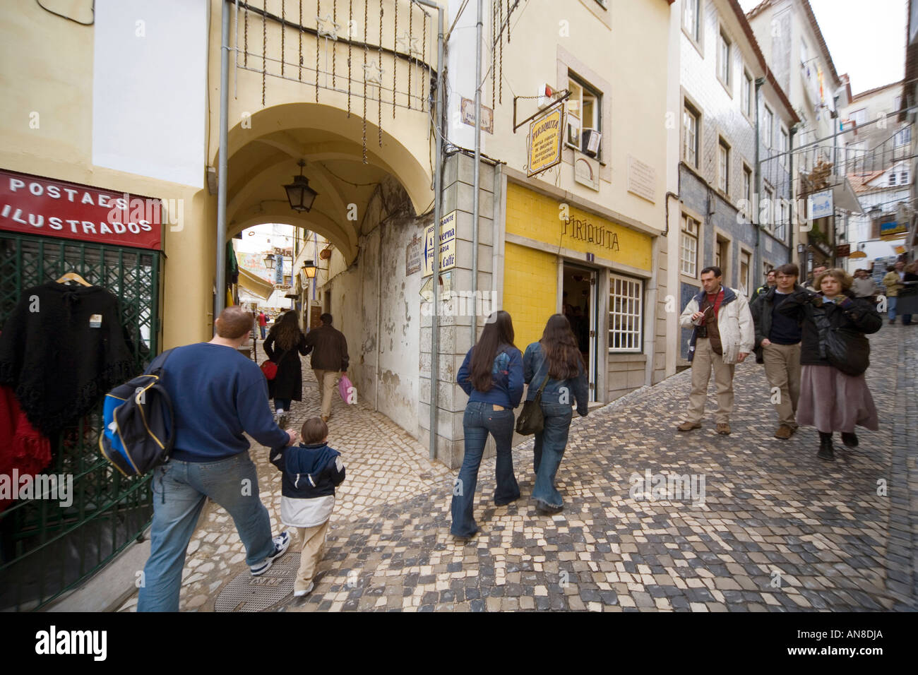 SINTRA PORTUGAL Tourists and shoppers stroll through the cobblestone streets and alleyways of this picturesque hillside town Stock Photo