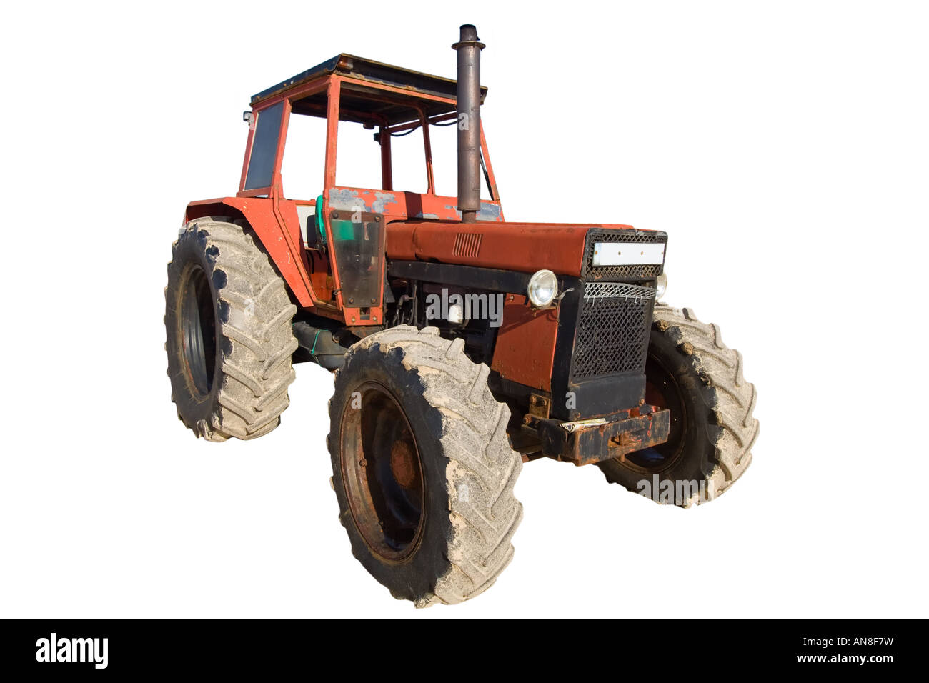 Old tractor isolated on white background Stock Photo - Alamy